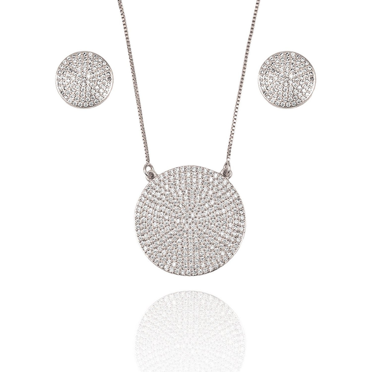 A matching silver jewelry set features a delicate chain necklace with a round, pavé-set crystal pendant accompanied by matching circular stud earrings against a white background.
