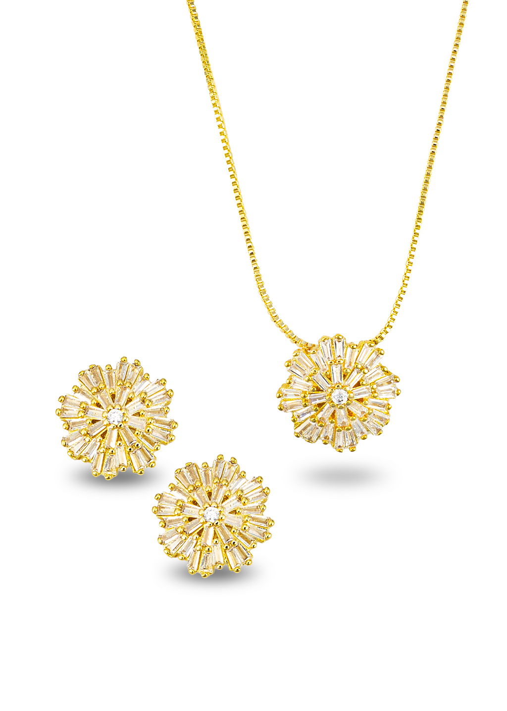A gold jewelry set features a delicate box chain necklace and matching stud earrings, each adorned with radiant baguette-cut white crystals arranged in a starburst pattern around a central diamond.