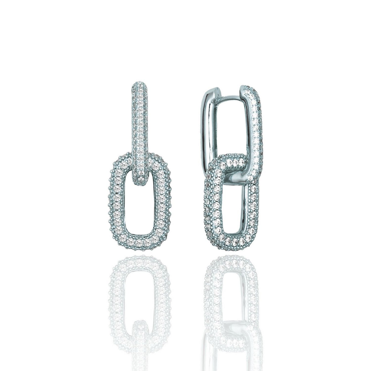 A pair of silver pavé link huggie hoop earrings sparkles against a clean white background.