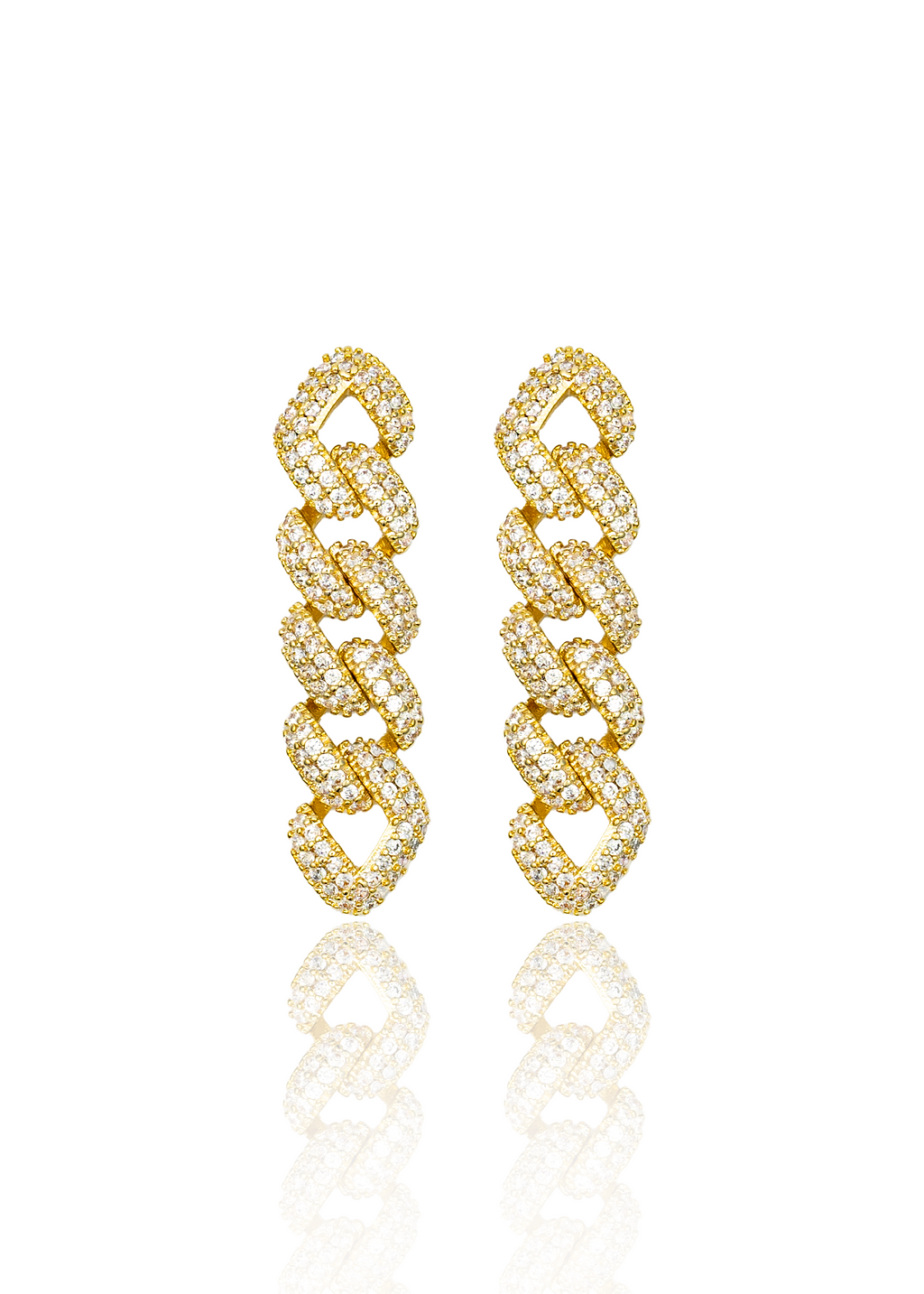 A pair of gold cuban link drop earrings encrusted with sparkling cubic zirconia stones stands upright against a plain white background.