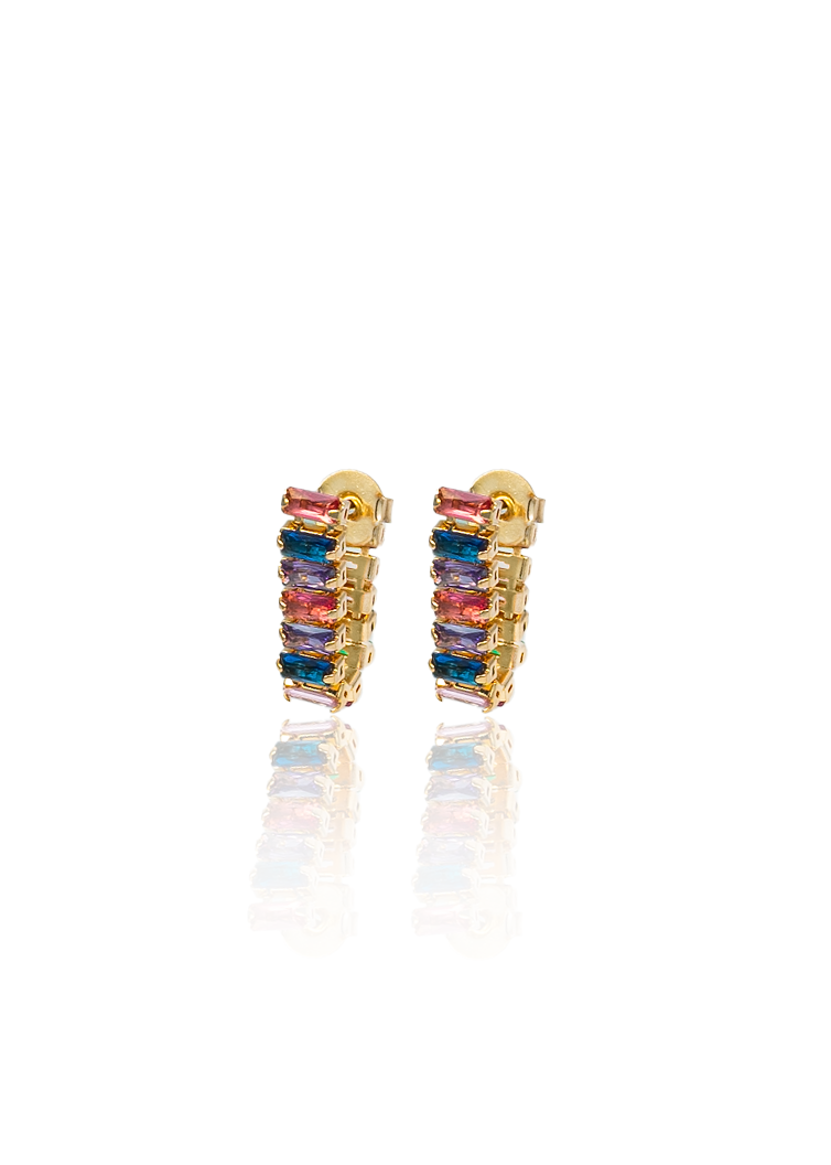 huggie earrings with blue baguette cubic zirconia stones. Modern crystal huggies with a sleek vertical design.