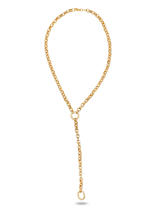 A thick gold lariat necklace featuring interconnected round links shines against a white background.