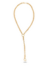 A thick gold lariat necklace featuring interconnected round links shines against a white background.