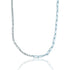 A striking half-tennis half-paperclip chain necklace combines sparkling round diamonds on one side with sleek interlocking metal links on the other.