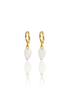 A pair of gold hoop earrings features dangling white heart-shaped charms against a clean white background.