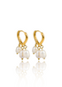 A pair of elegant gold hoop earrings features dangling freshwater pearls against a clean white background.