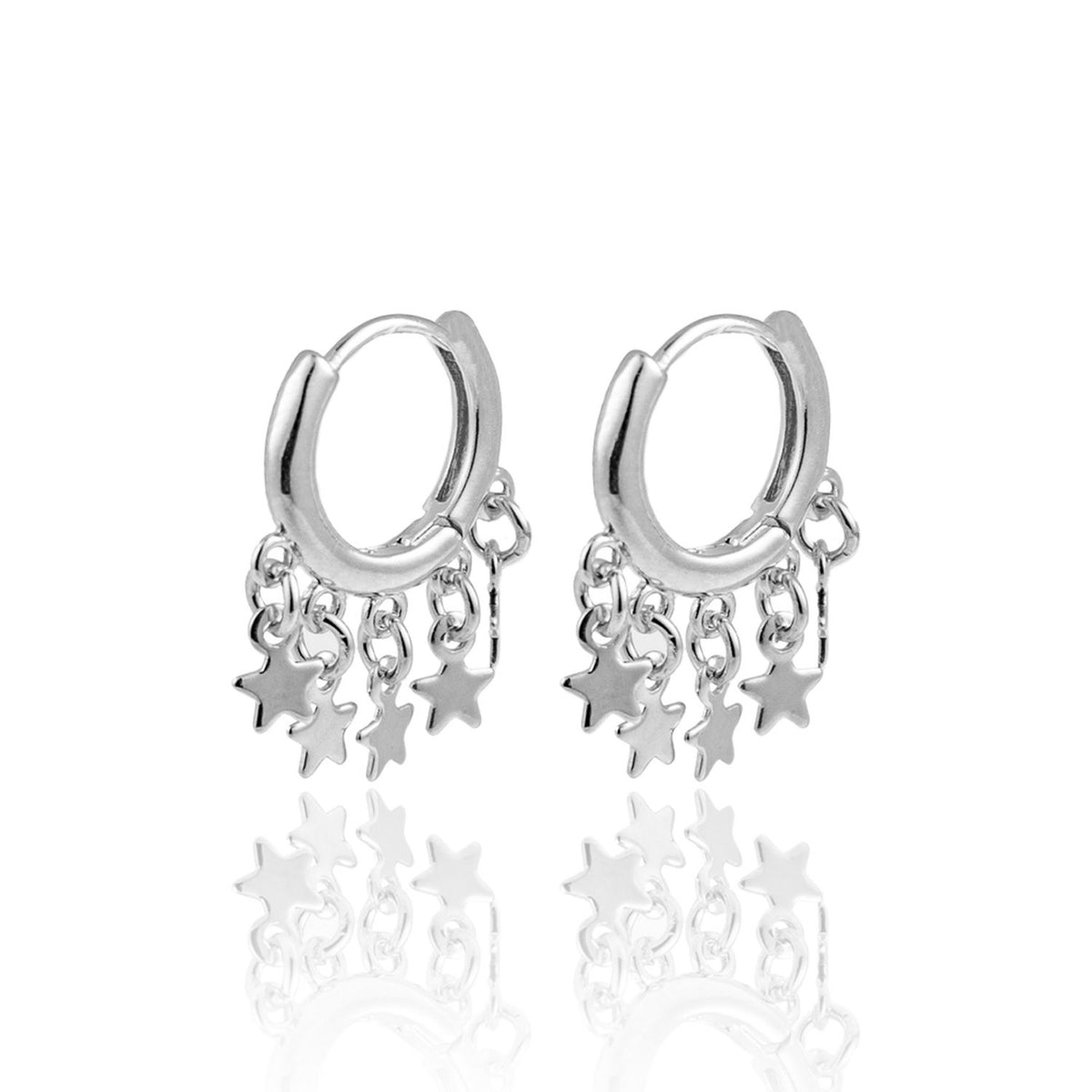 A pair of silver hoop earrings features delicate dangling star charms against a clean white background.