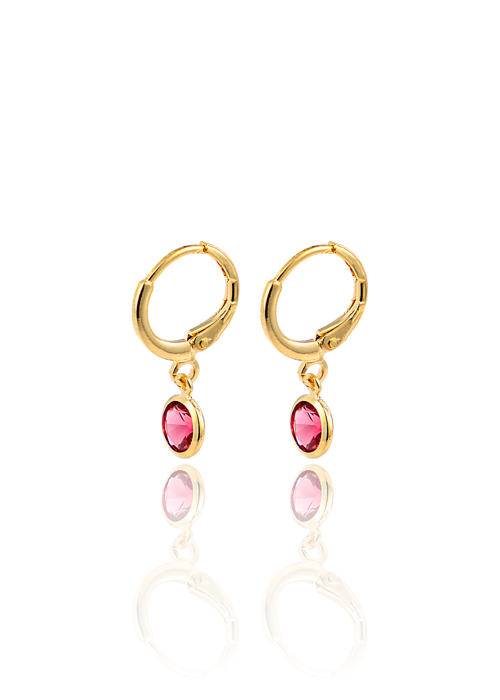 Two gold huggie hoop earrings dangle vibrant pink gemstone charms against a clean white background.