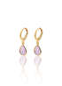 A pair of elegant gold hoop earrings features dangling teardrop-shaped pink gemstones against a clean white background.