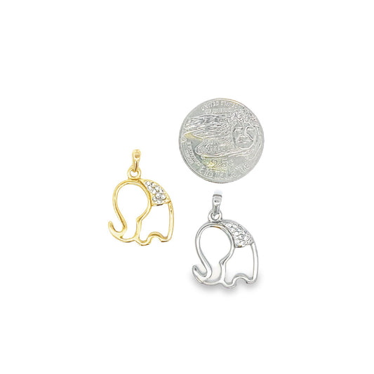 A gold and a silver elephant pendant with crystal-embellished ears lie next to a US quarter coin for size comparison on a white background.