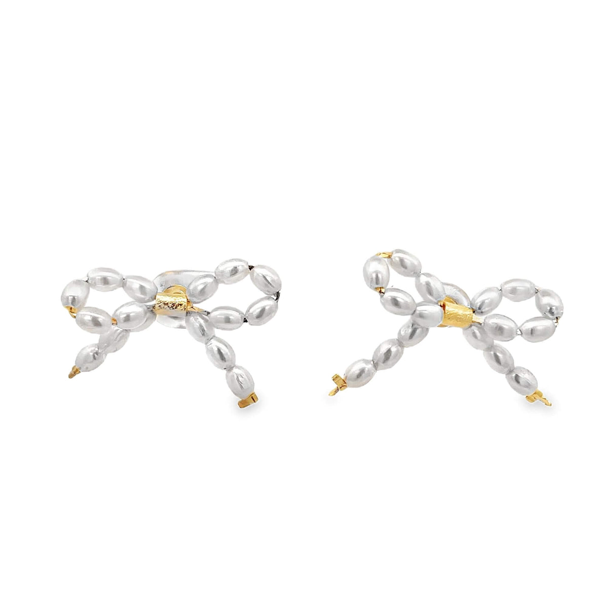 A pair of delicate pearl bow earrings features glossy white rice pearls shaped into bows with gold-tone centers against a clean white background.