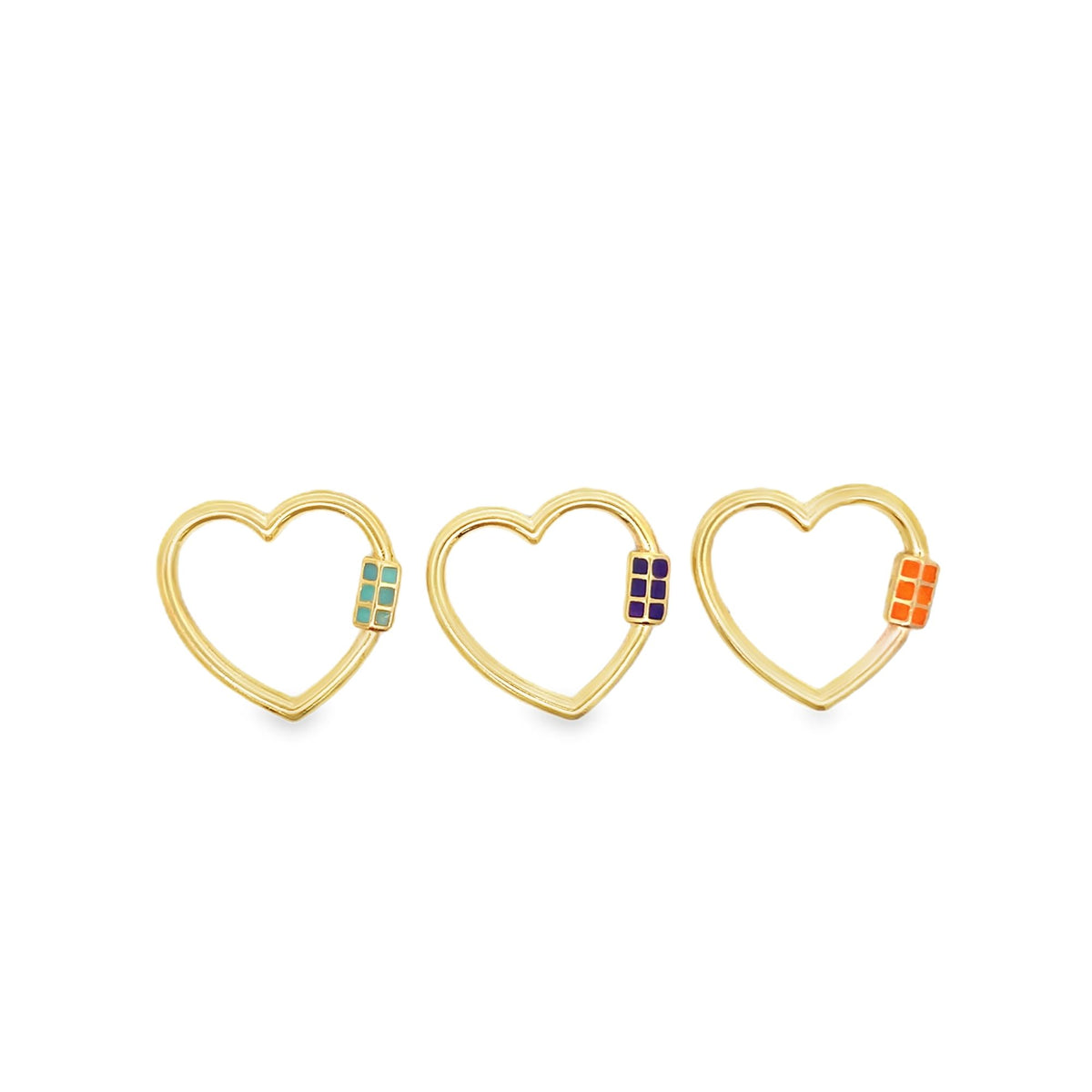 Three gold heart-shaped charm earrings featuring colorful enamel tile clasps in teal, purple, and orange display against a clean white background.
