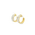 A pair of gold huggie hoop earrings sparkles with inset emerald-cut cubic zirconia stones against a clean white background.