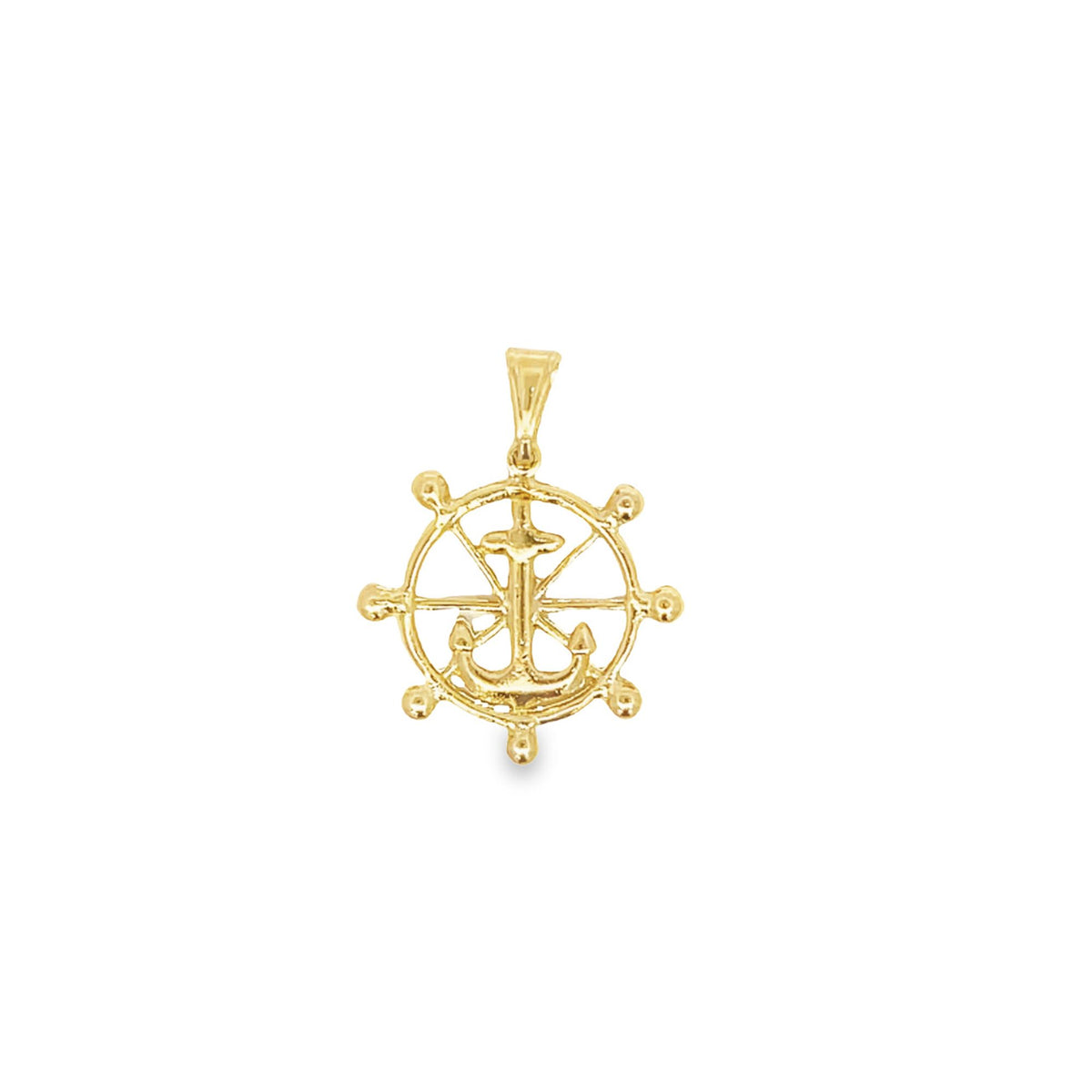 A polished yellow gold nautical pendant features a ship's wheel combined with an anchor design against a clean white background.