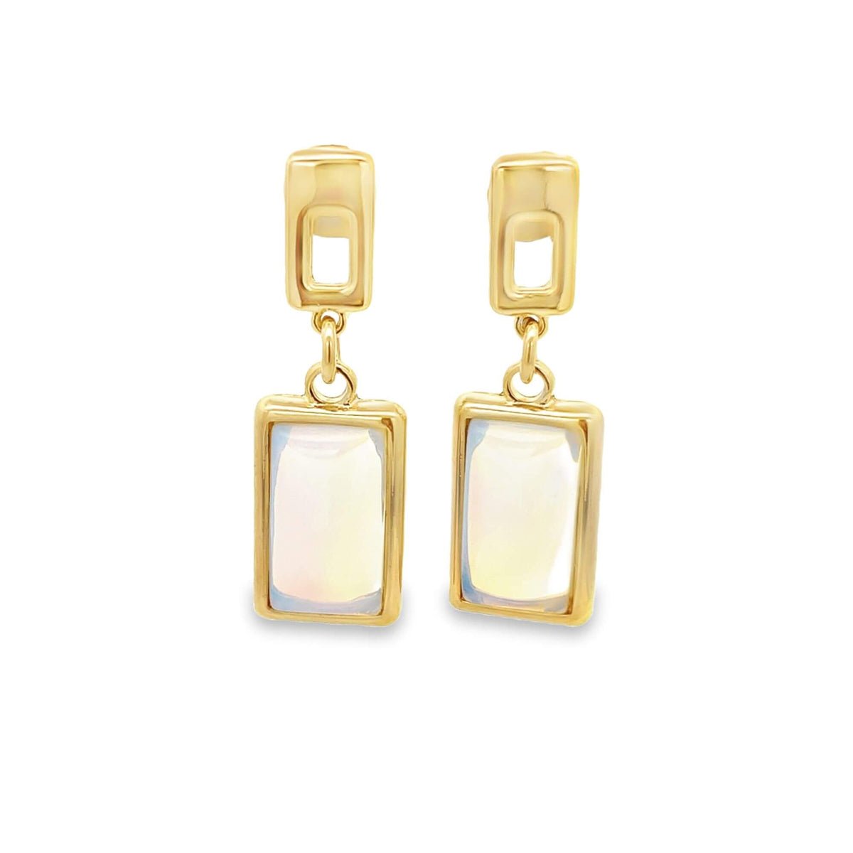 A pair of gold drop earrings features rectangular opalescent stones hanging from geometric stud tops.