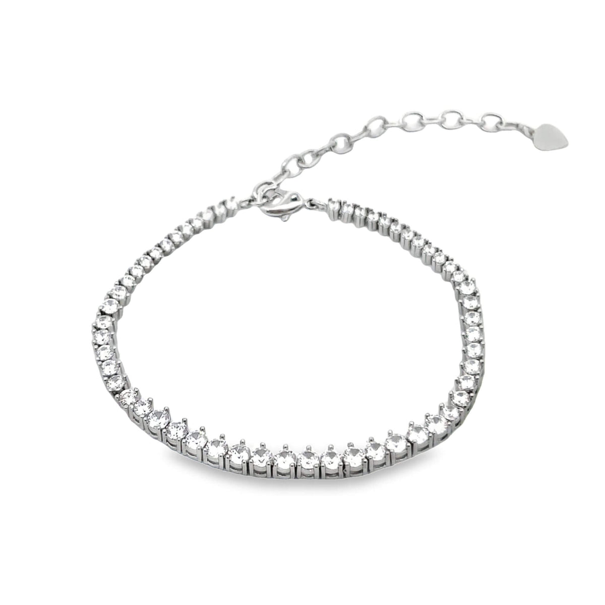 A shimmering silver tennis bracelet sparkles against a white background, featuring a continuous line of clear cubic zirconia stones and an adjustable chain.