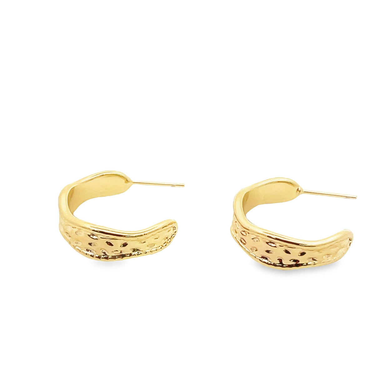 A pair of textured gold hoop earrings rests side by side against a clean white background.