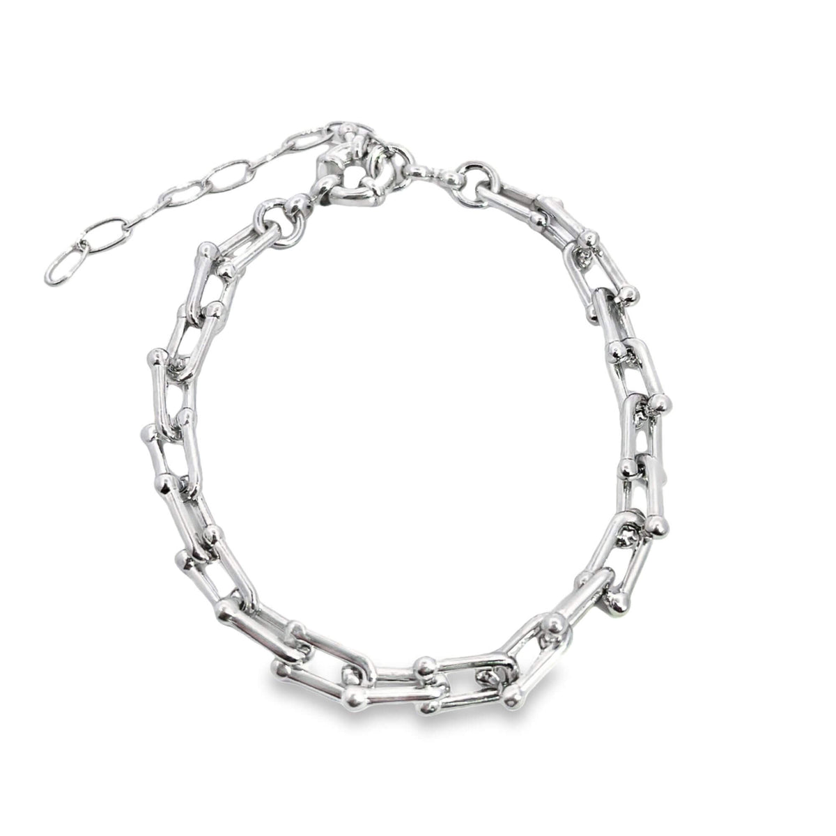 A polished silver U-link chain bracelet rests on a white background, showcasing its bold geometric links and adjustable clasp.
