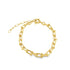 A gold chain link bracelet with U-shaped links rests on a plain white background.