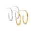 Two pairs of textured hoop earrings in silver and gold rest on a clean white background.