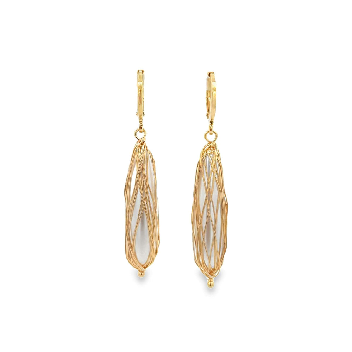 A pair of elegant gold wire-wrapped drop earrings features elongated white pearls encased in an intricate web of fine gold wire against a clean white background.