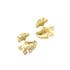 A pair of shiny gold ginkgo leaf earrings glimmers against a clean white background.