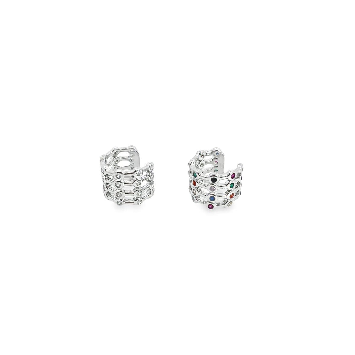 Two silver multi-band ear cuffs sparkle against a clean white background, showcasing intricate geometric designs encrusted with clear and multicolored gemstones.