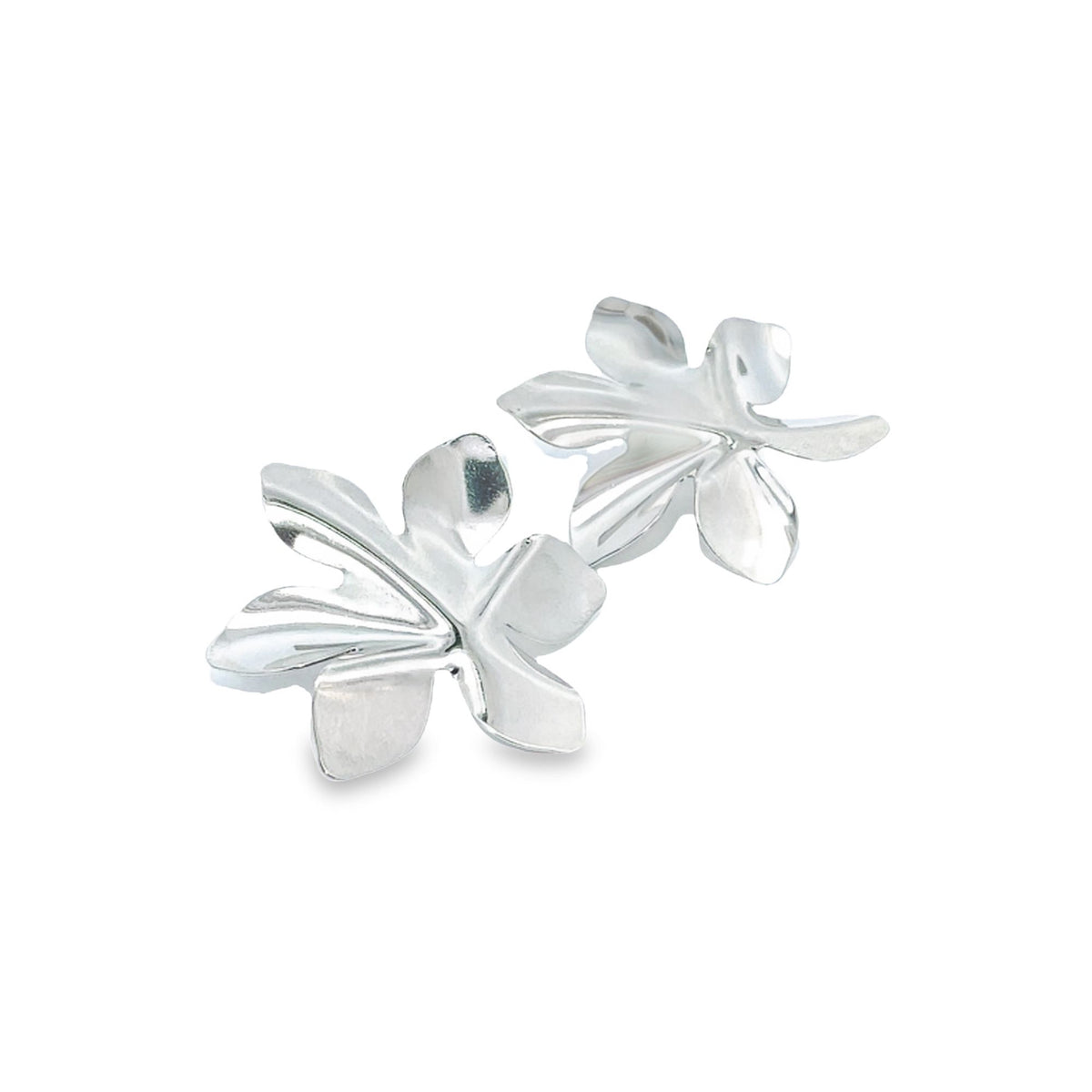 A pair of polished silver plumeria flower stud earrings rests against a clean white background.