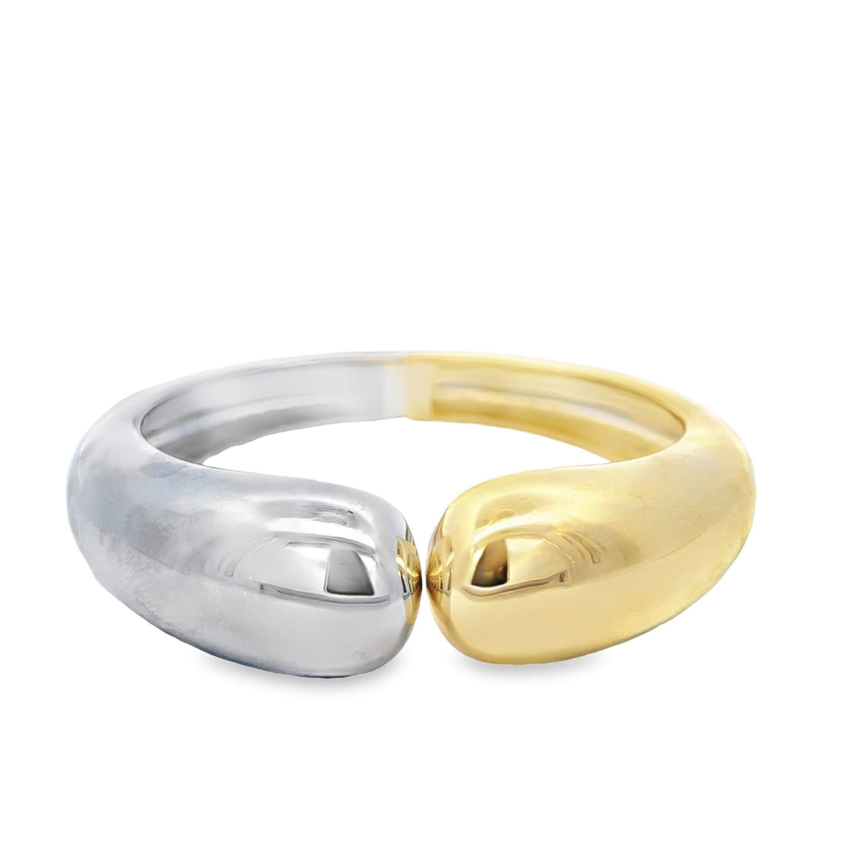 A two-tone gold and silver bypass ring rests on a clean white background.