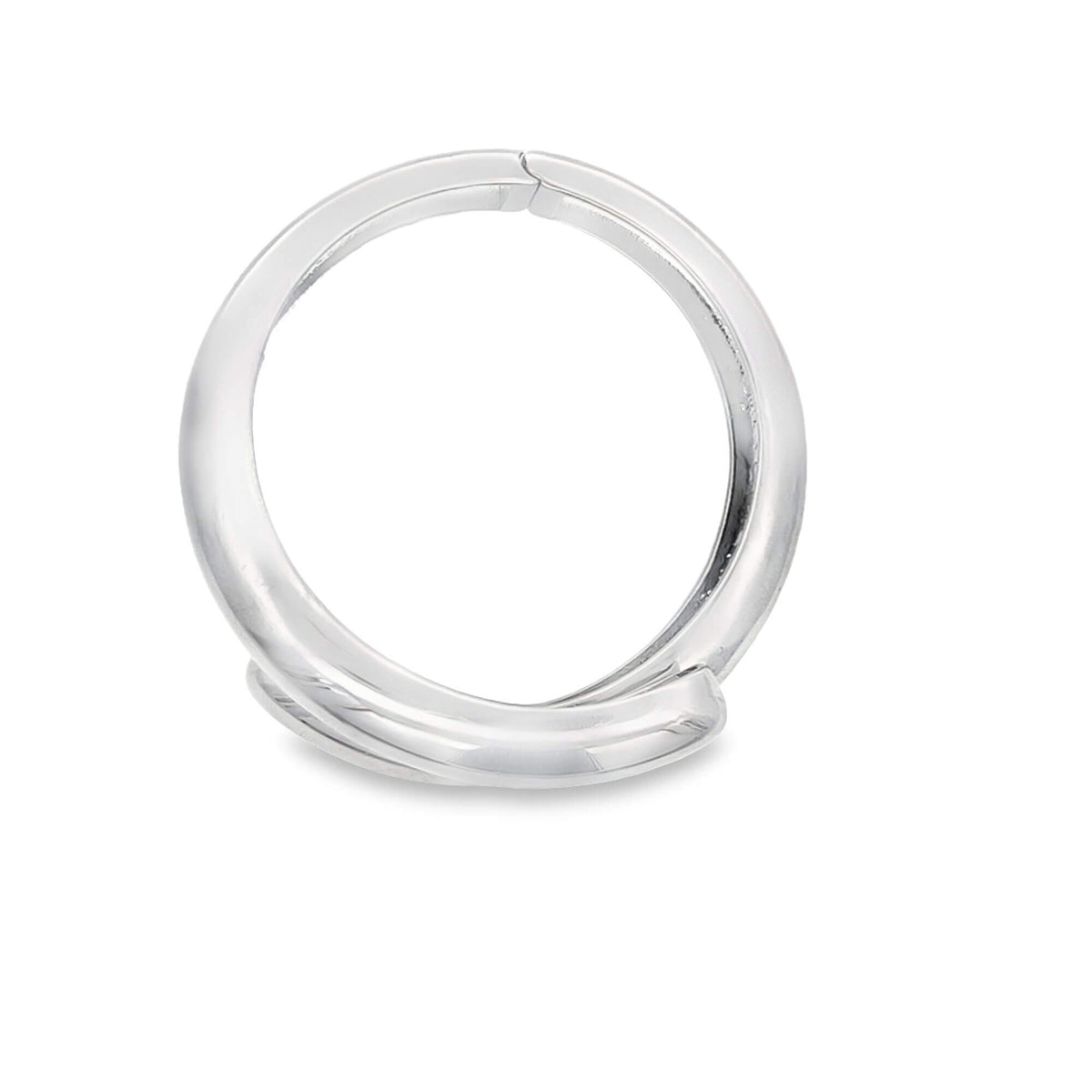 A polished silver continuous hoop ring displays a sleek crossover design against a white background.