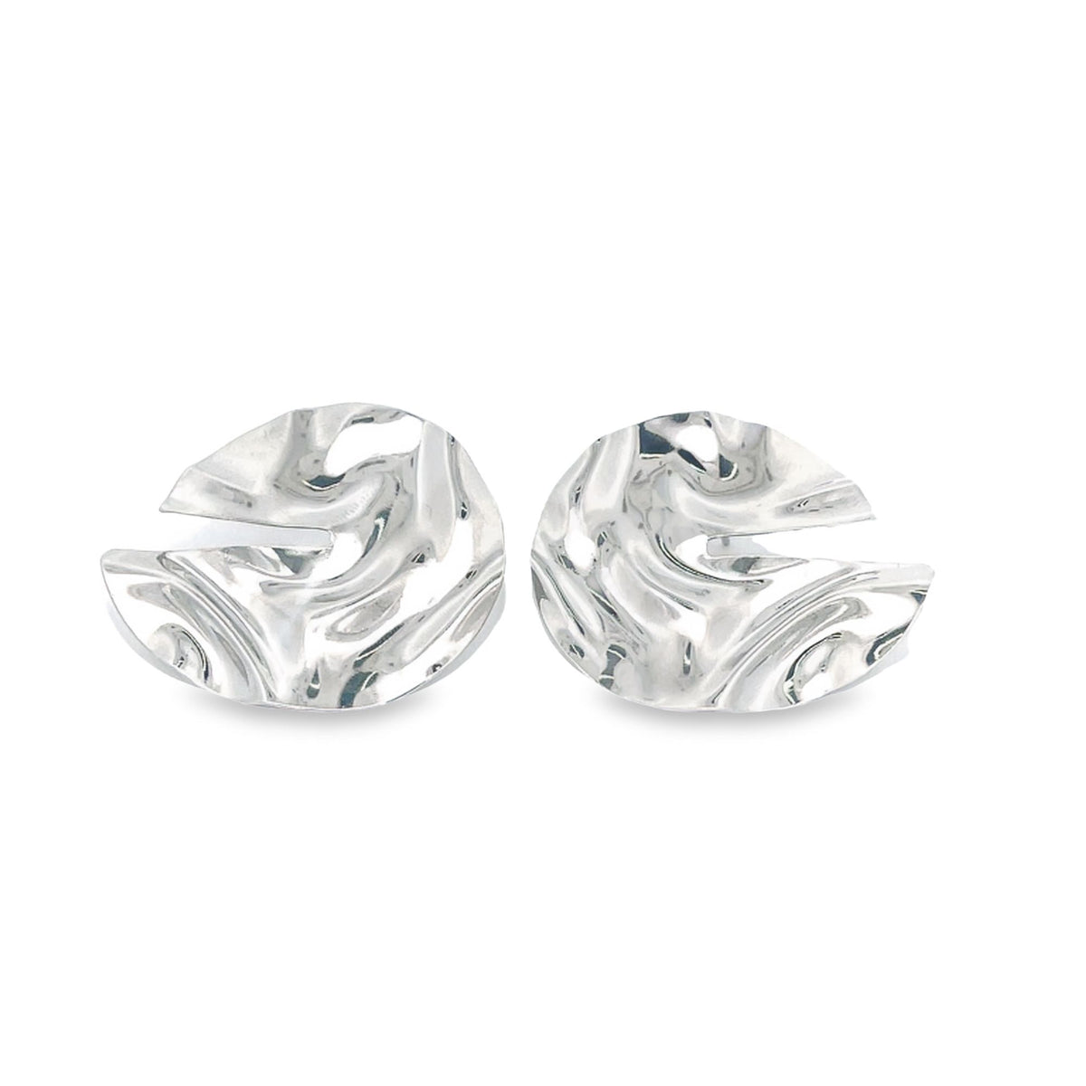 A pair of shiny silver earrings featuring a wavy, abstract design rests against a clean white background.