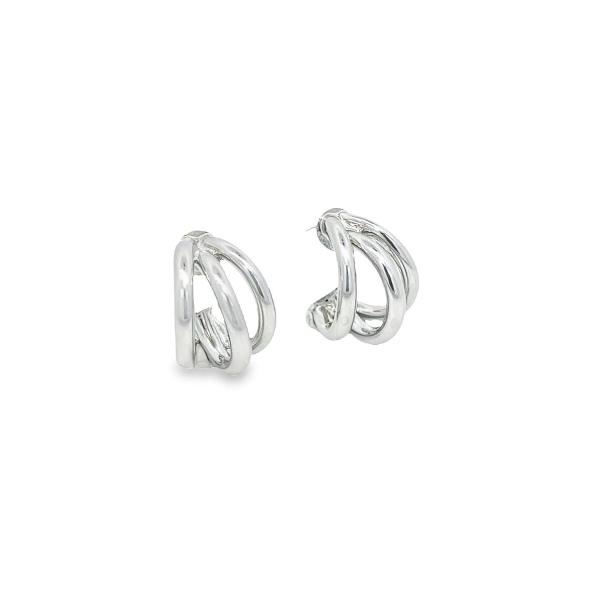 A pair of polished silver triple-band hoop earrings sits against a clean white background.