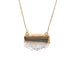 A delicate gold chain holds a rectangular pendant featuring a brown banded agate gemstone topped with raw white crystals.