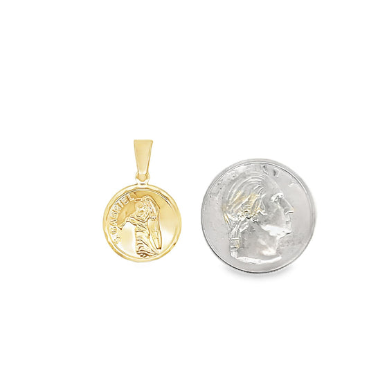 A gold Saint Gabriel pendant rests beside a US quarter coin to show its compact size on a white background.