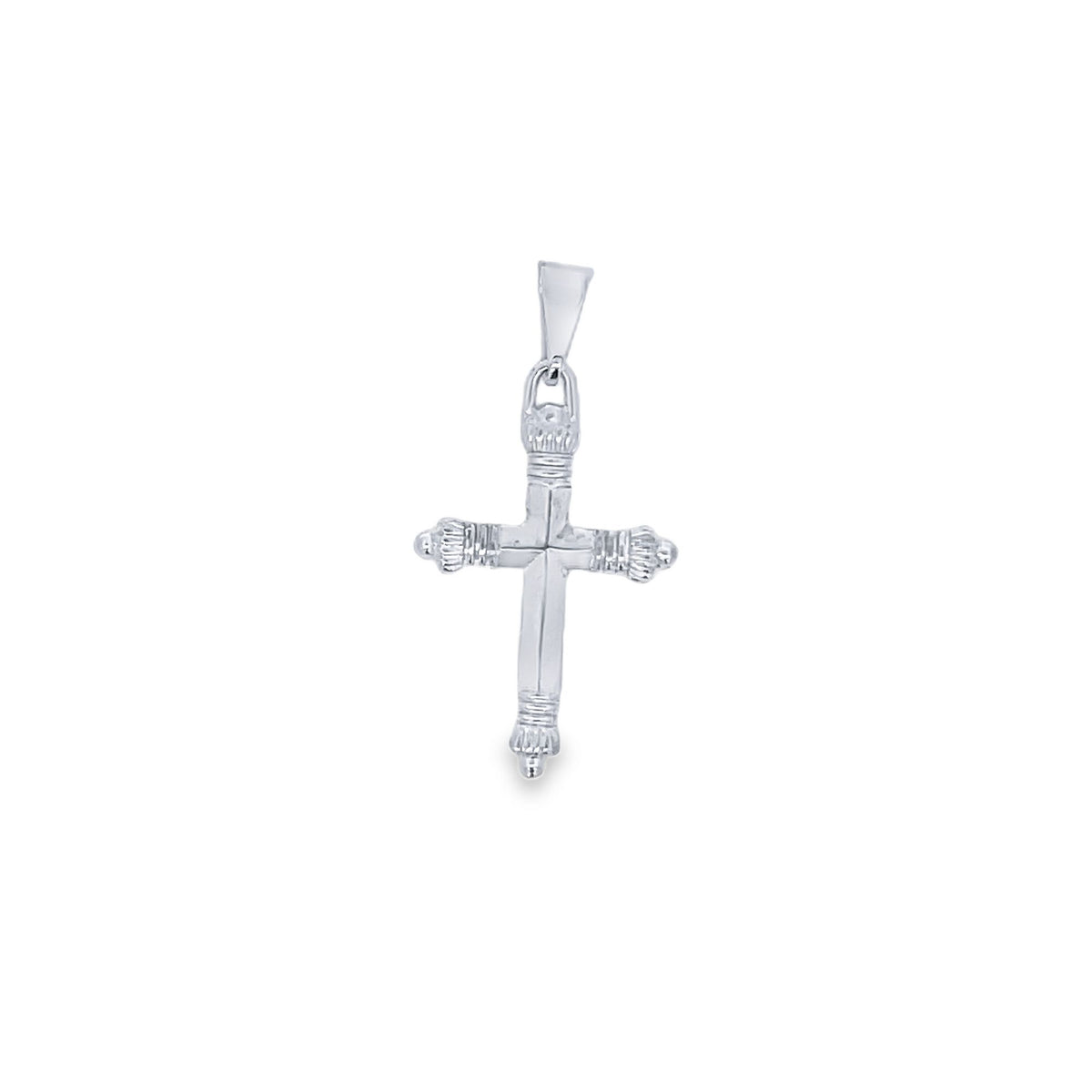 A polished sterling silver cross pendant features intricate textured end caps against a clean white background.