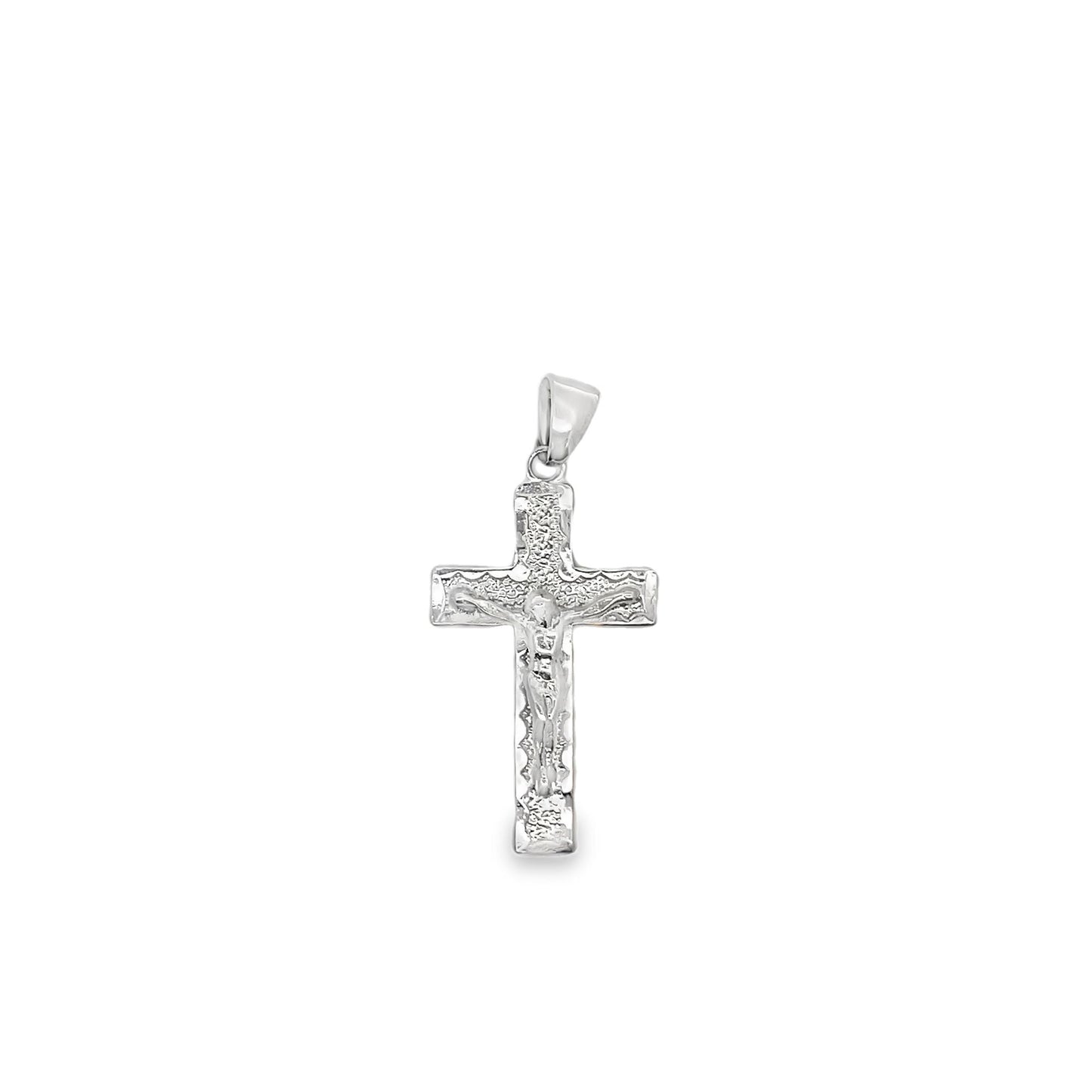 A textured silver crucifix pendant hangs vertically against a clean white background.