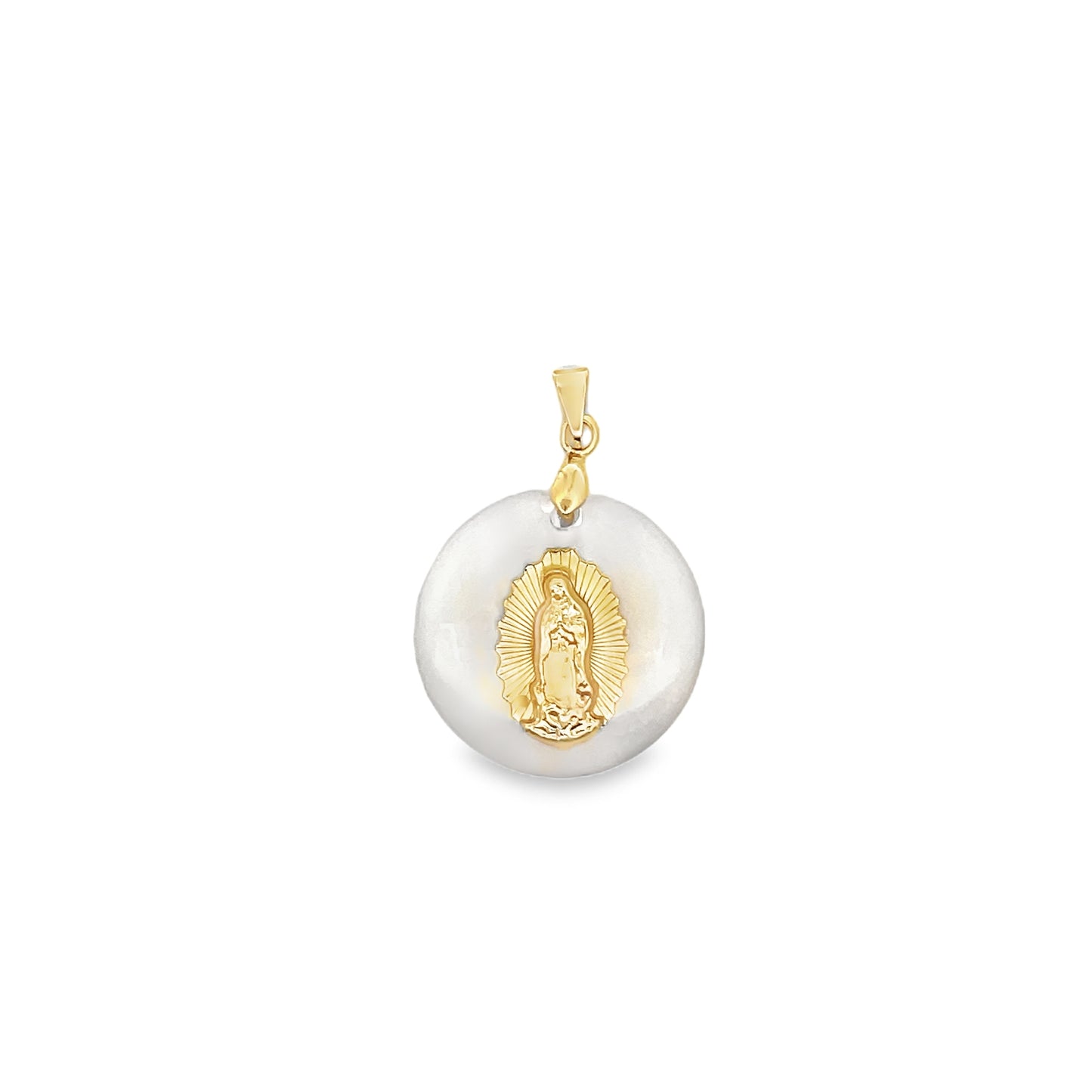 A gold-framed Our Lady of Guadalupe pendant rests against a smooth white mother-of-pearl background.