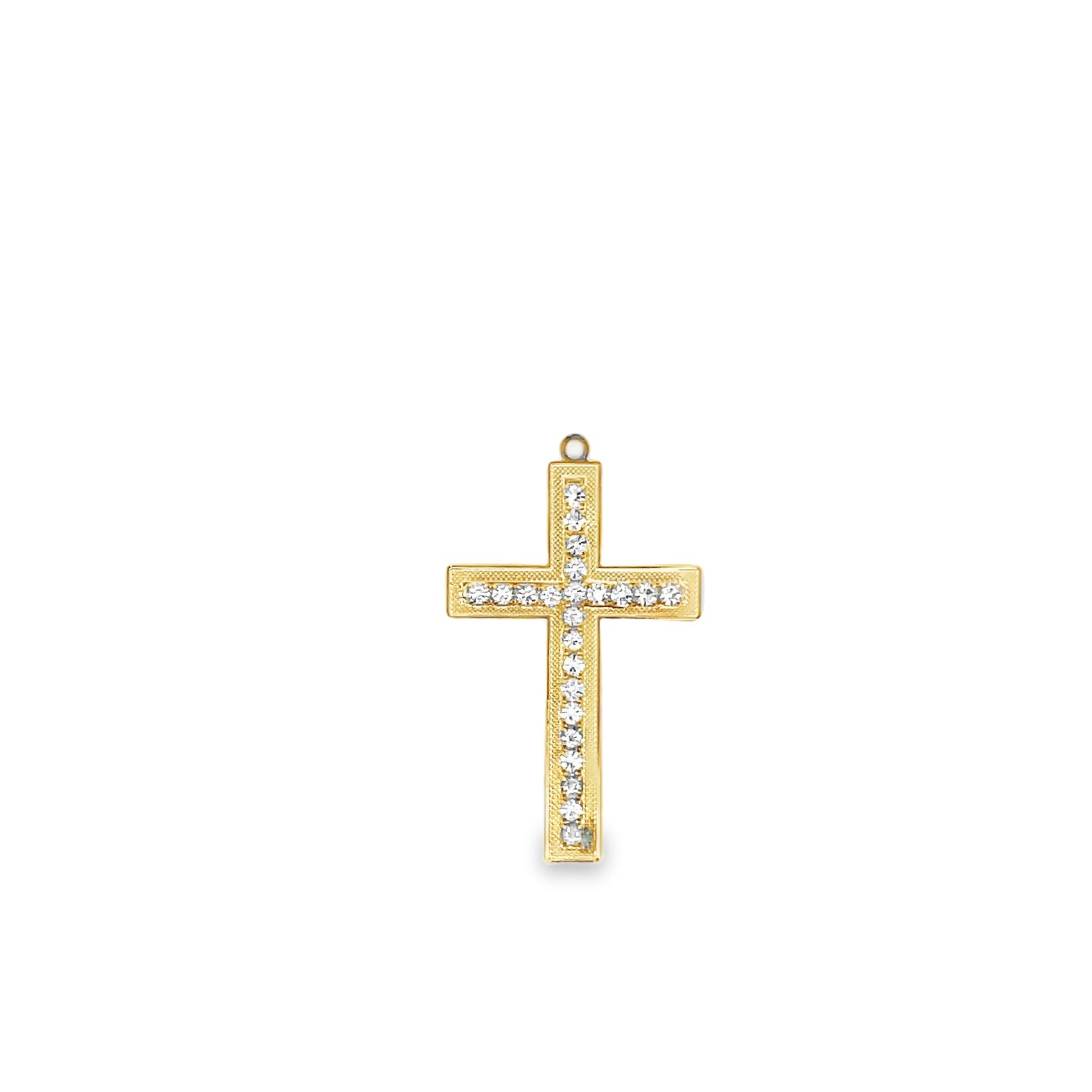 A gold cross pendant features a row of sparkling diamond accents set against a white background.