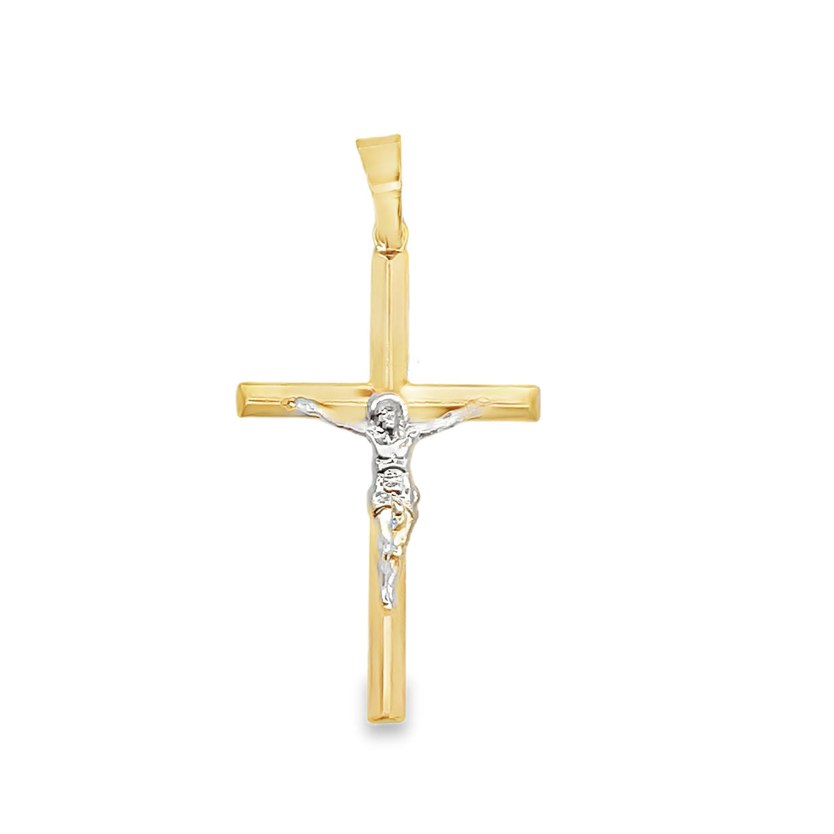 A two-tone crucifix pendant features a white gold figure of Jesus on a polished yellow gold cross against a plain white background.
