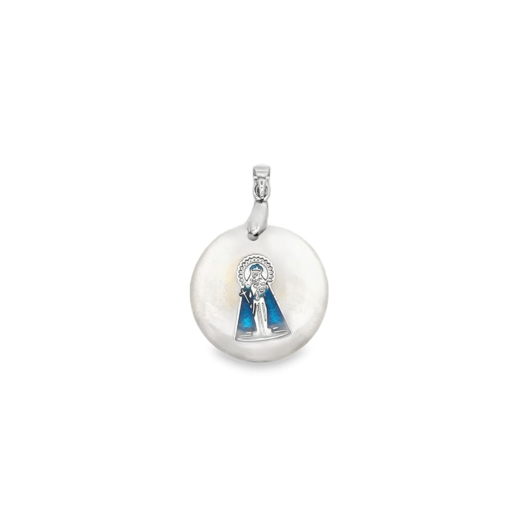 A round silver pendant features an enamel inlay of the Virgin of El Cisne in blue and white.