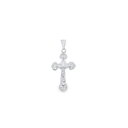A detailed sterling silver crucifix pendant displays an intricately engraved corpus against a plain white background.