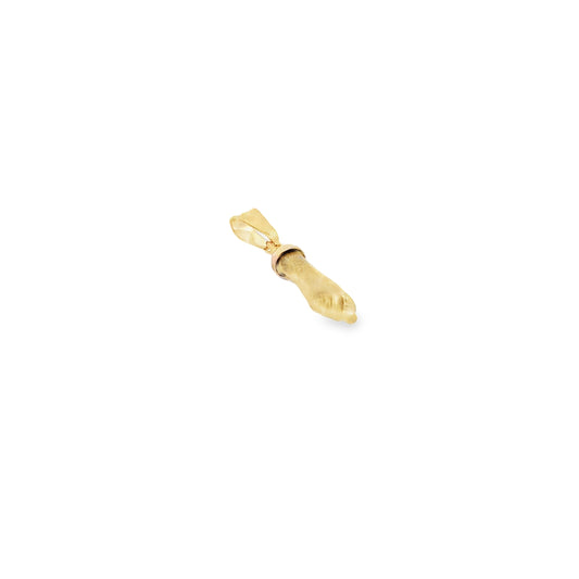 A gold figa amulet pendant rests against a clean white background, showcasing its classic clenched-fist protective design.