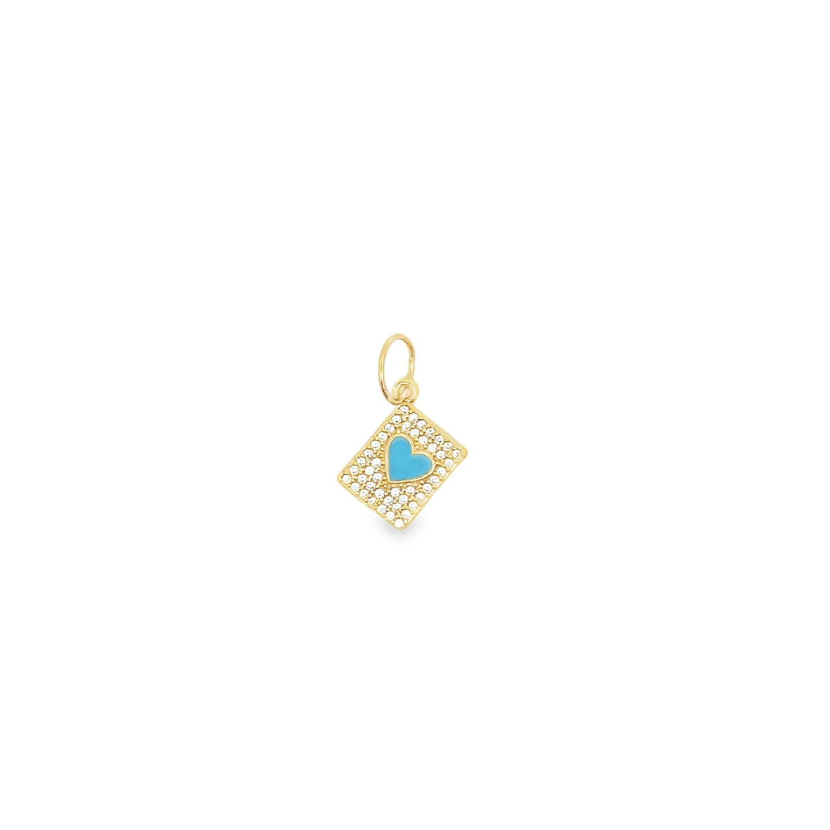 A gold diamond-pave charm features a bright turquoise enamel heart in the center against a white background.