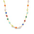 A delicate gold chain necklace features an array of vibrant, multi-colored bezel-set crystals in a rainbow of hues.