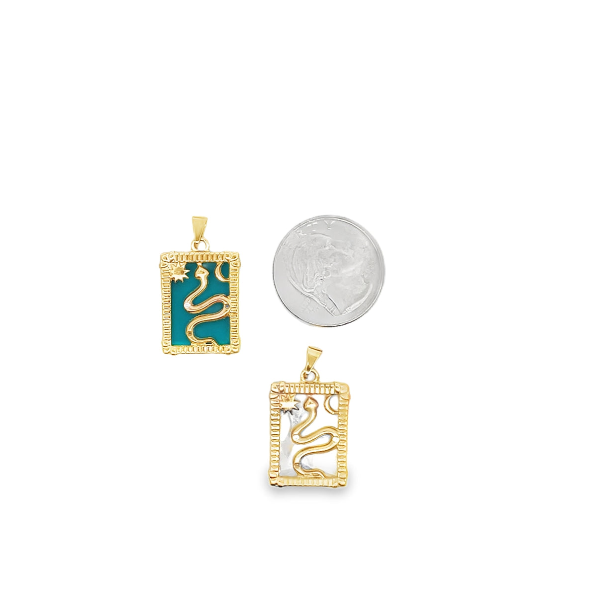 Two rectangular gold snake pendants displayed alongside a coin for size reference, featuring a turquoise-enamelled version and a clear quartz version with celestial motifs.