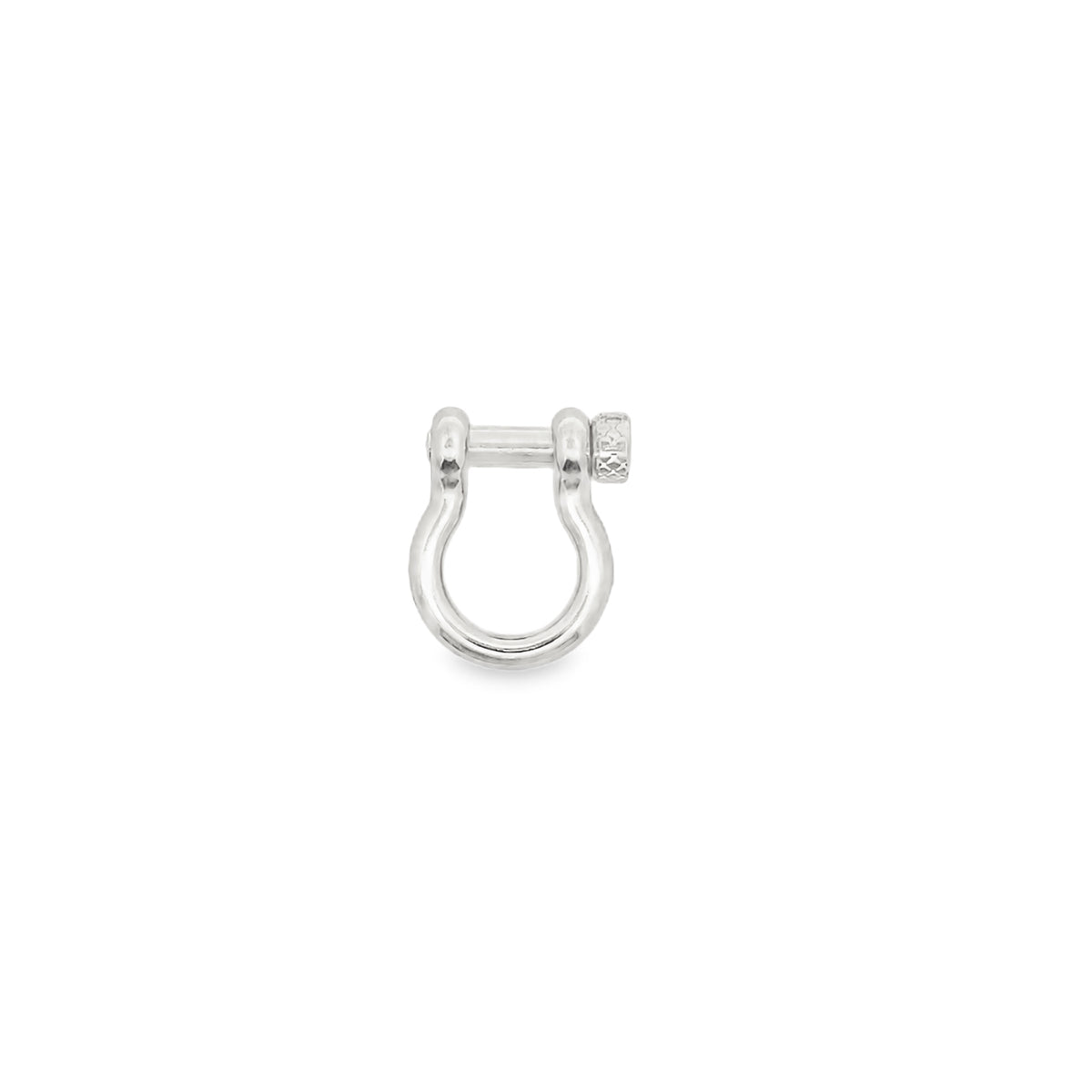 A polished silver shackle earring rests against a clean white background.