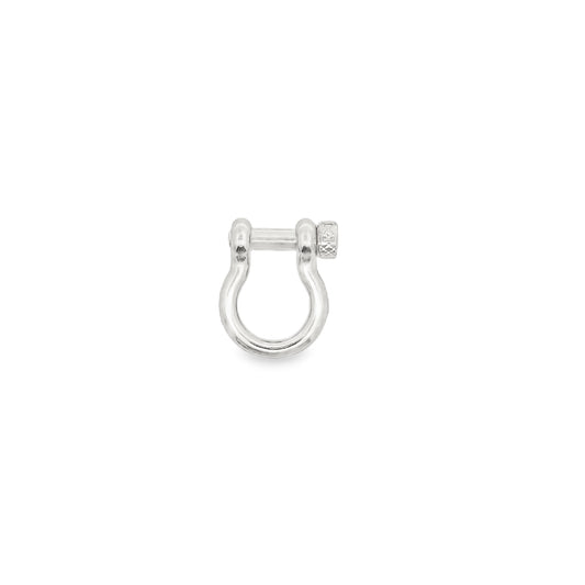 A polished silver shackle earring rests against a clean white background.