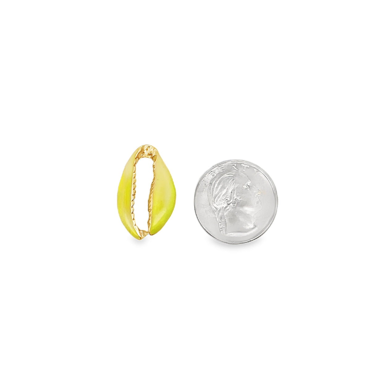 A yellow enamel cowrie shell charm rests next to a US dime for size comparison.
