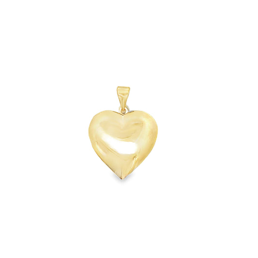 A smooth, polished yellow gold heart pendant glimmers against a clean white background.