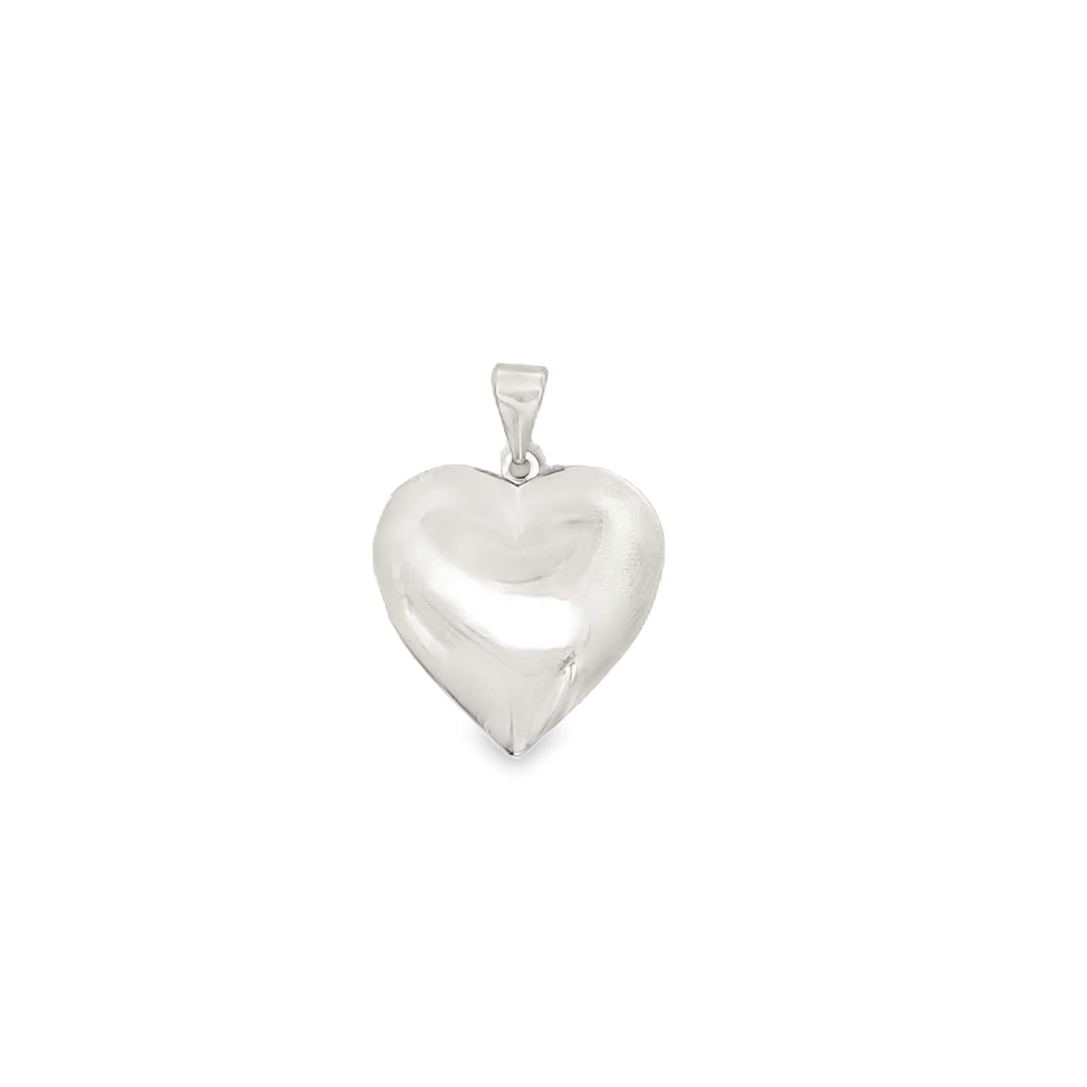 A polished silver heart pendant gleams against a plain white background.